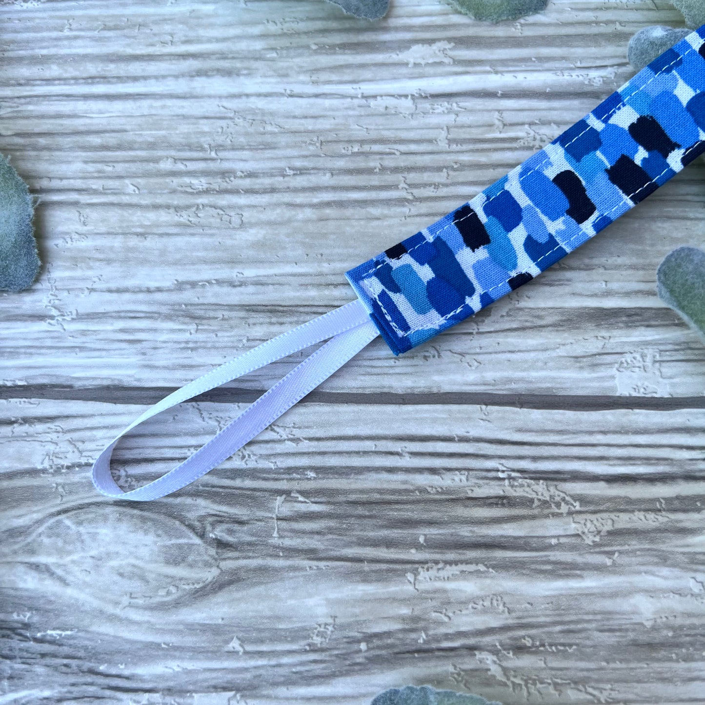 Blue Paint Splotches Pacifier Clip