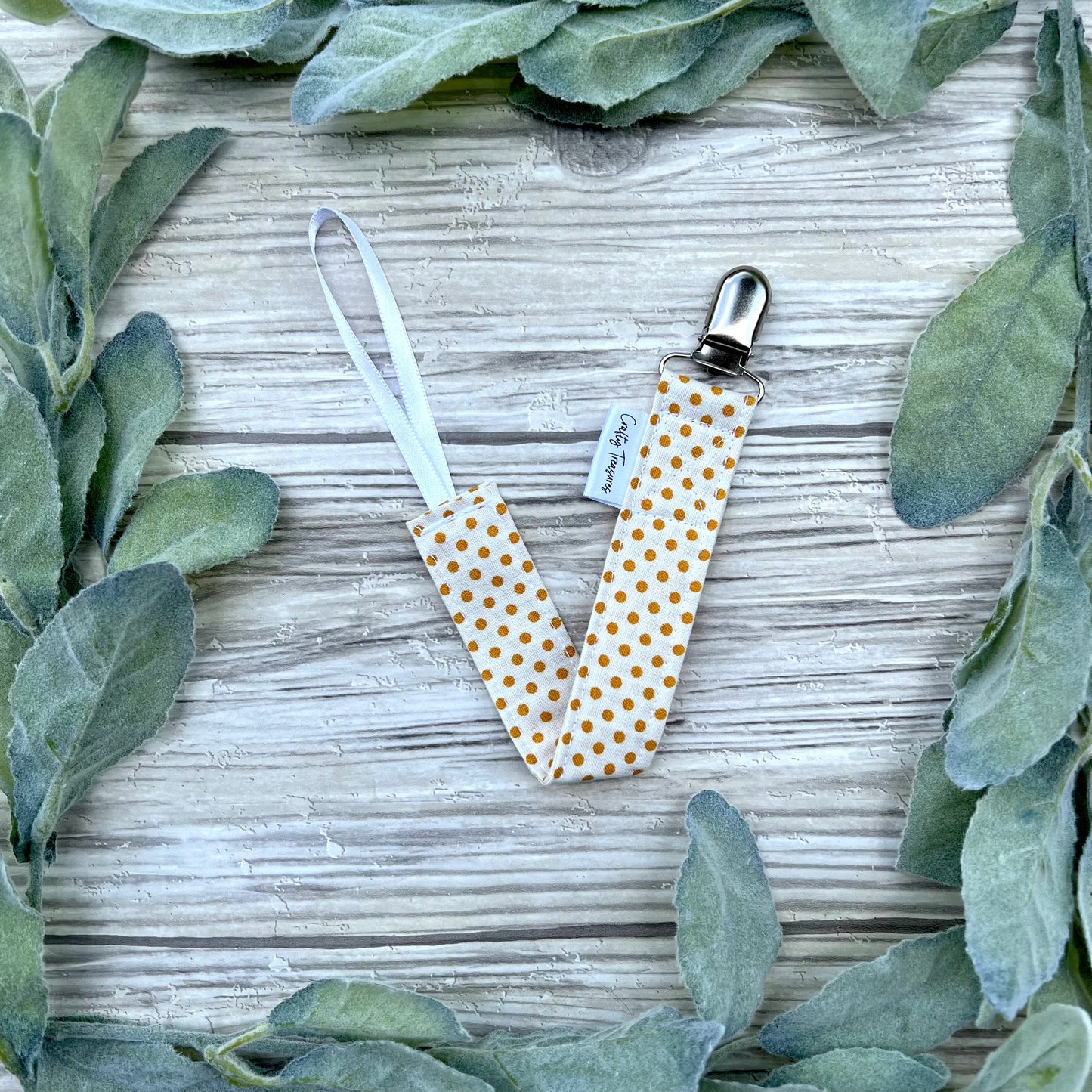 Mustard Dots Pacifier Clip