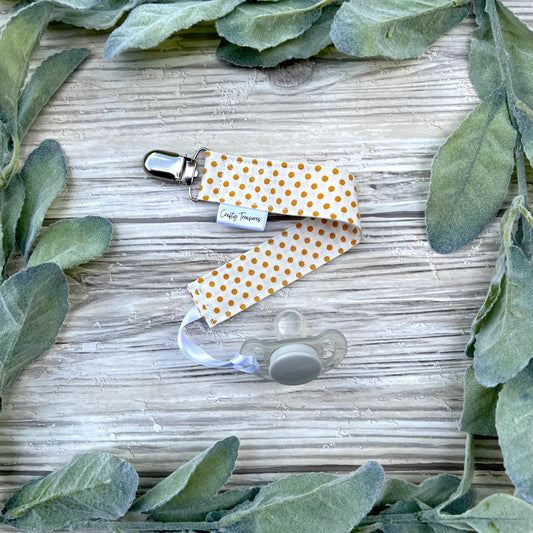 Mustard Dots Pacifier Clip